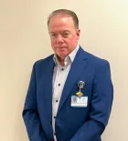 Robert E Maughan, MD