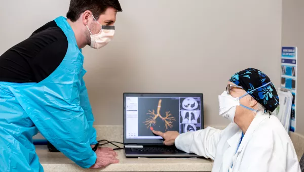 Lung nodule team talking to each other