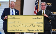 Cape Fear Valley CEO Michael Nagowski and FTCC President Dr. Mark Sorrells with a ceremonial check for CFVH’s historic donation to FTCC’s Nursing and Allied Health programs.